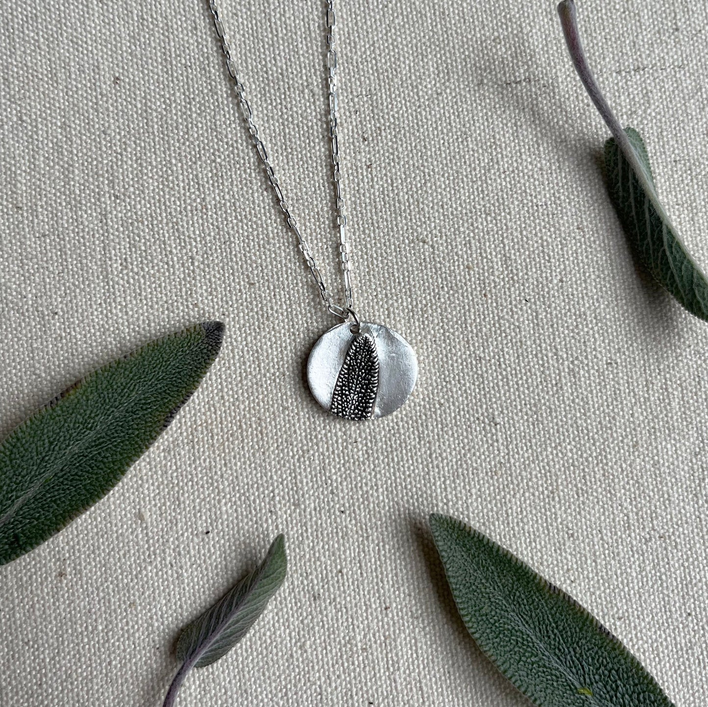 plant medallion necklace